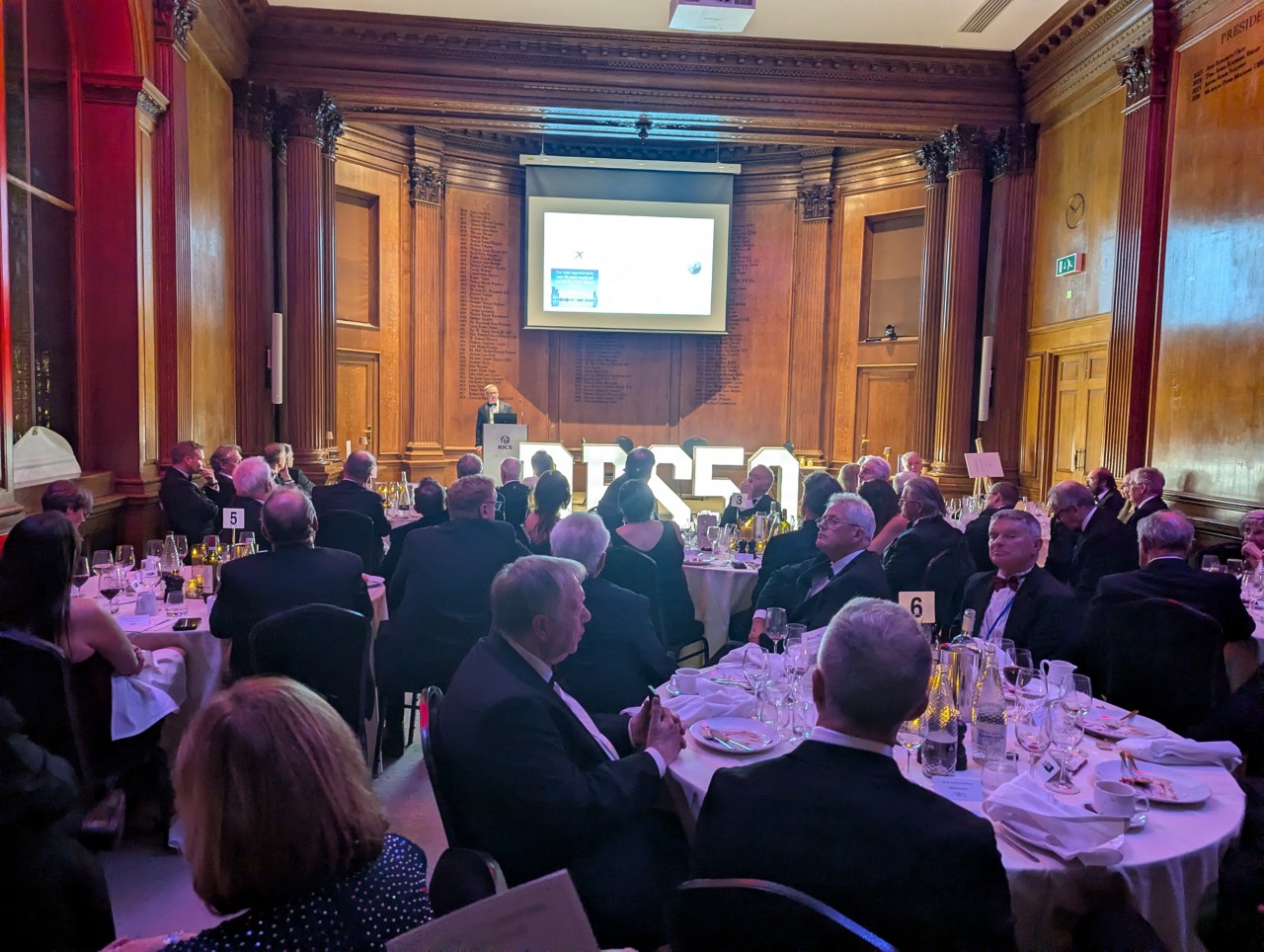 People sat in a hall for the DRS 50 gala dinner